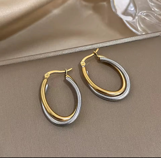 Elegant Gold & Silver Stainless Steel Earrings – Timeless Two-Tone Studs for Women.