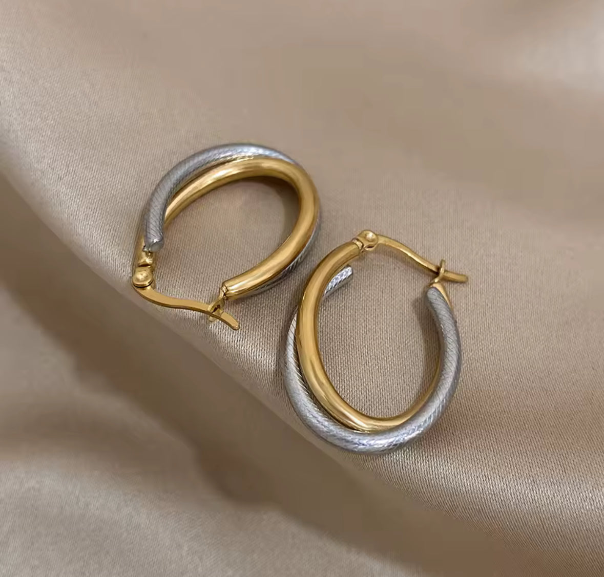 Elegant Gold & Silver Stainless Steel Earrings – Timeless Two-Tone Studs for Women.