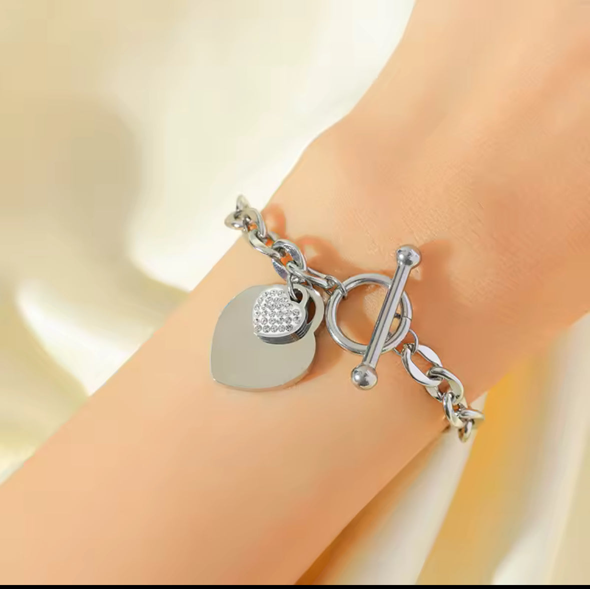 stainless steel gold double heart necklace and bracelet set.