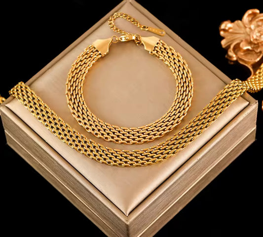 Gold stain, stainless steel wide, watch band bracelet, and necklace set.
