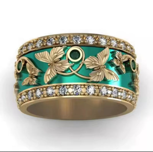 Green butterfly inlaid zircon women's gold overlay stainless steel ring.