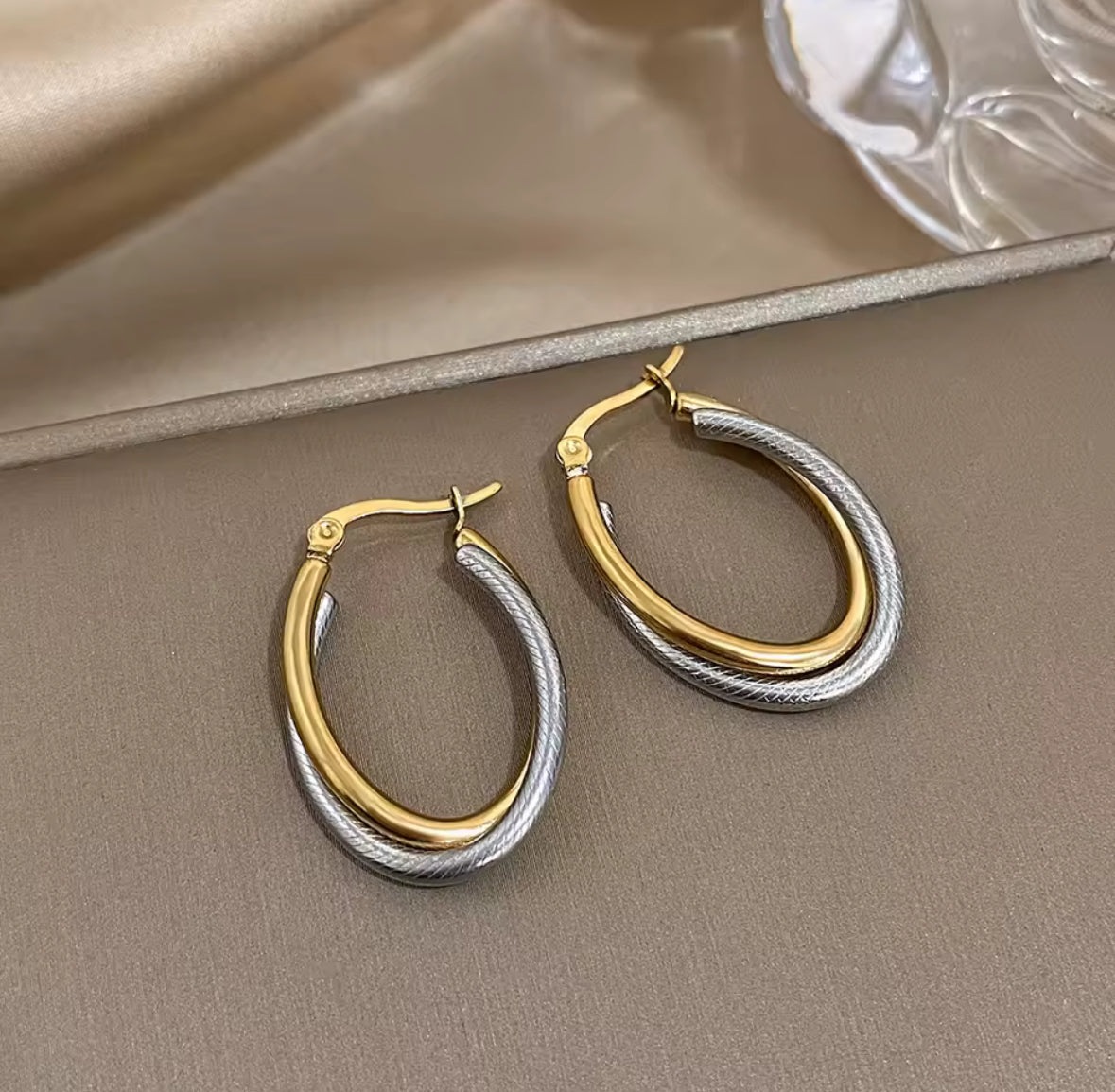 Elegant Gold & Silver Stainless Steel Earrings – Timeless Two-Tone Studs for Women.