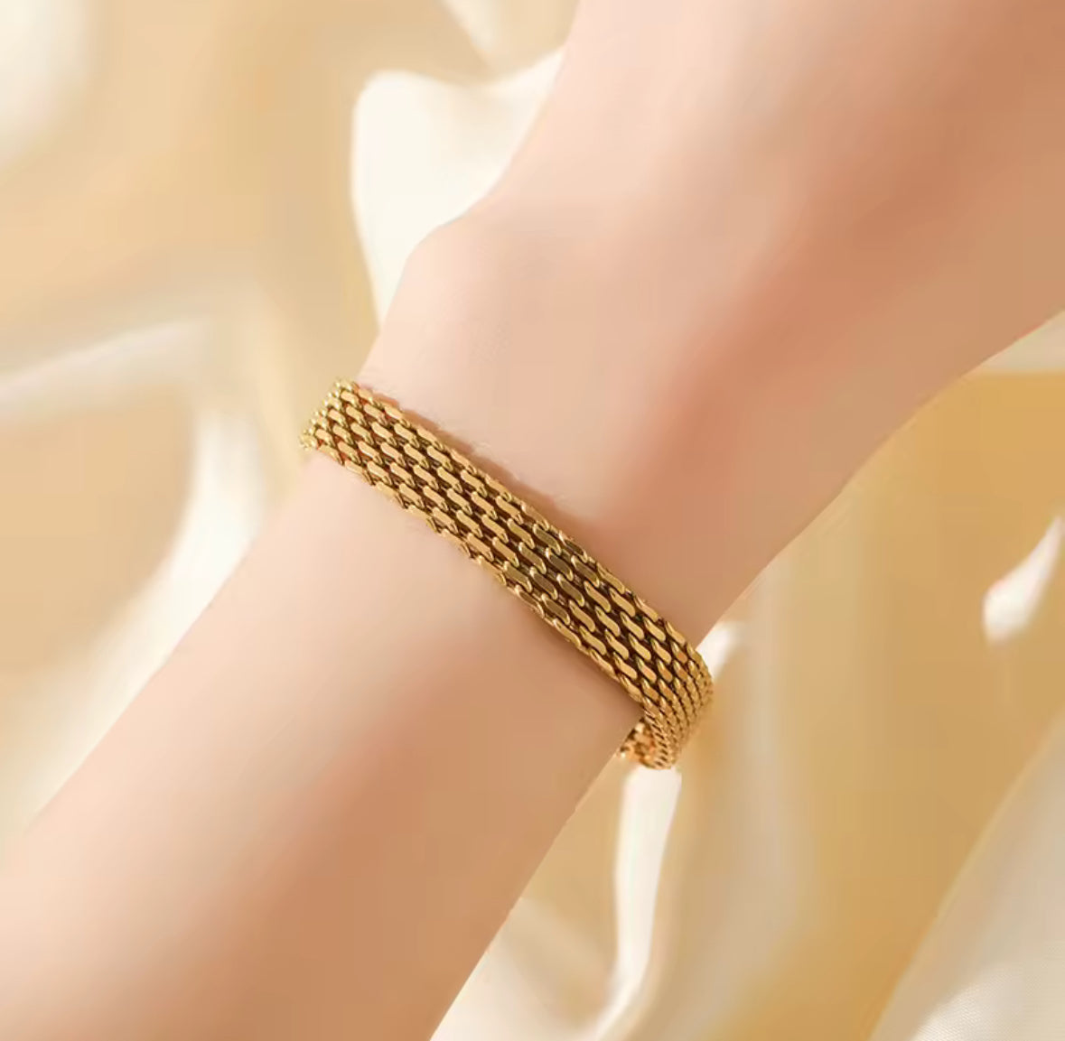 Gold stain, stainless steel wide, watch band bracelet, and necklace set.