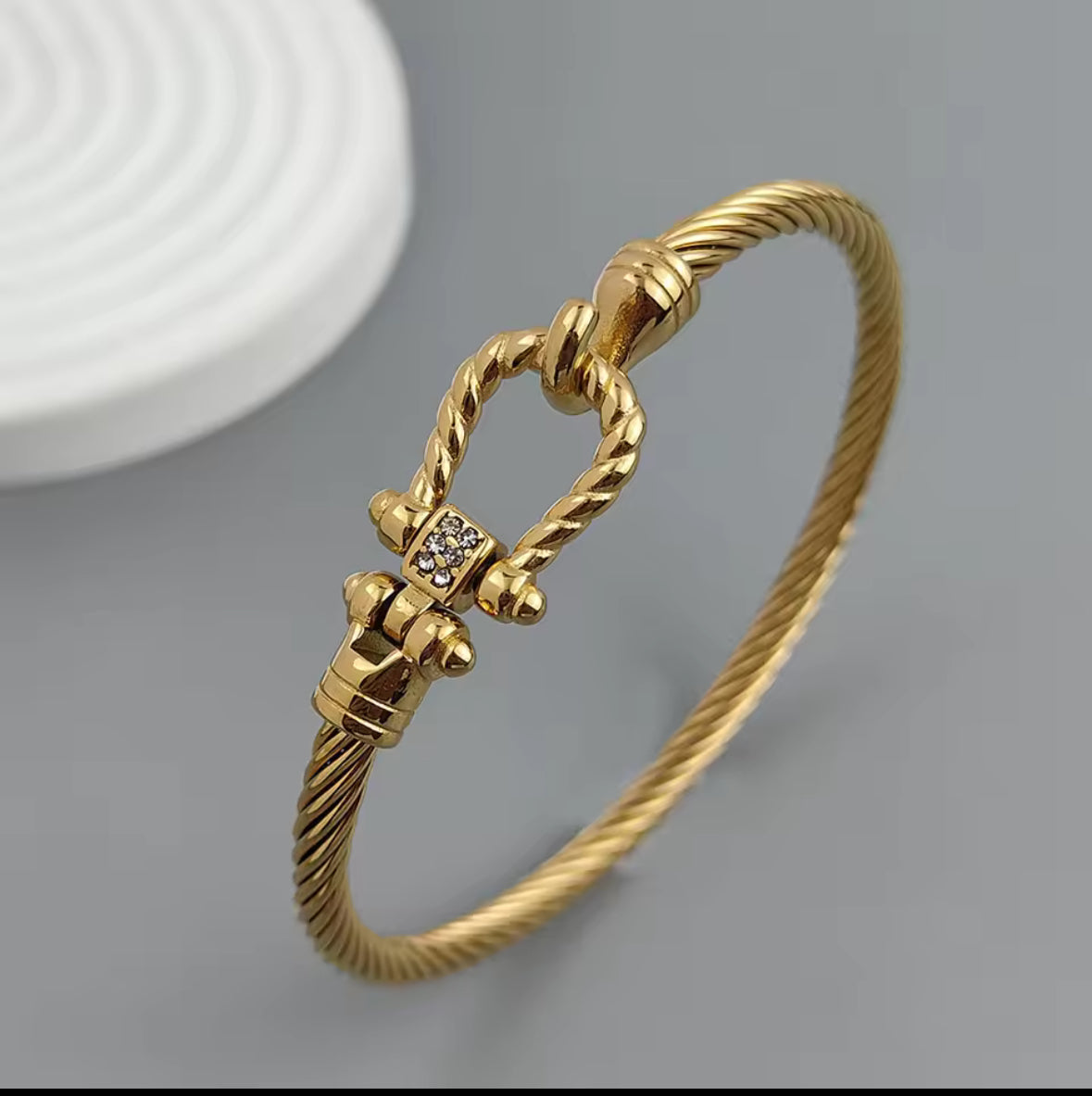 Gold Stainless Steel Wire Horseshoe Lock Bracelet – Designer-Inspired Button Clasp Bangle for Women.
