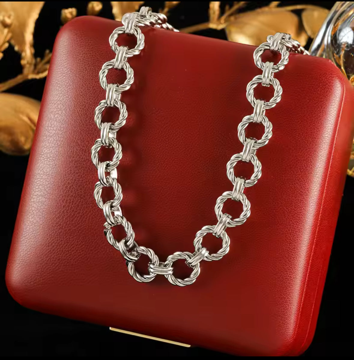 Silver stainless steel circular twisted link Necklace and bracelet set.