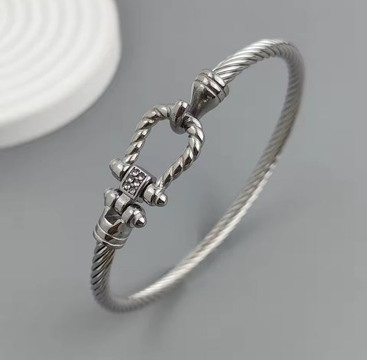 Silver Stainless Steel Wire Horseshoe Lock Bracelet – Designer-Inspired Button Clasp Bangle for Women.
