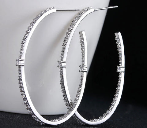 Picture of E379-GOLD OR SILVER HALF MOON CZ HOOP EARRING